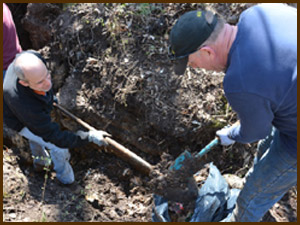 volunteers removing trash from sinkhole in Perry County Missouri