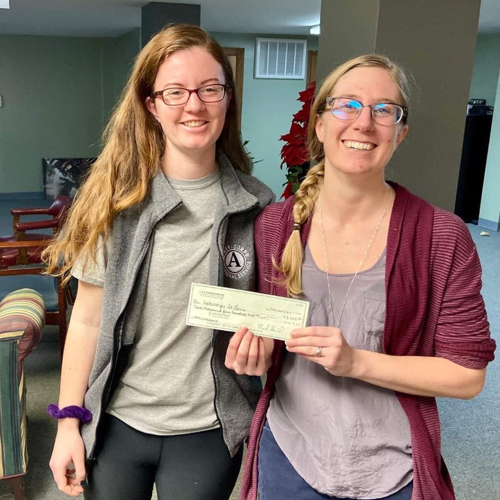 check being presented to AmeriCorps St. Louis