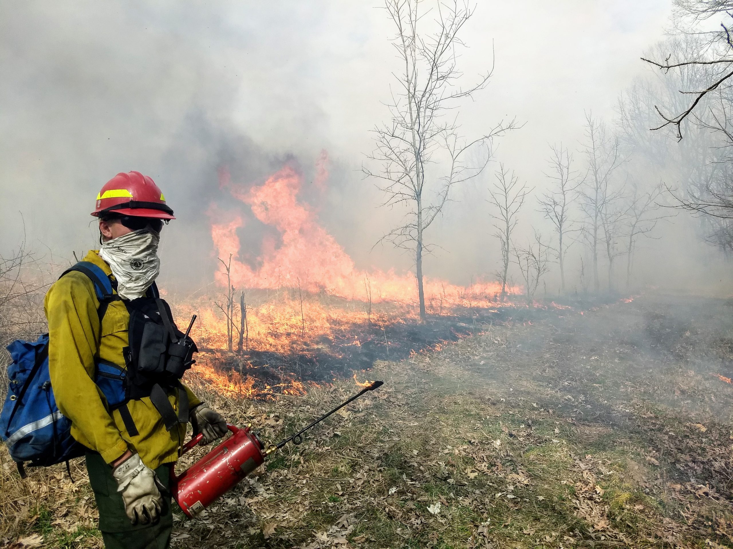 AmeriCorps members supervise prescribed fire